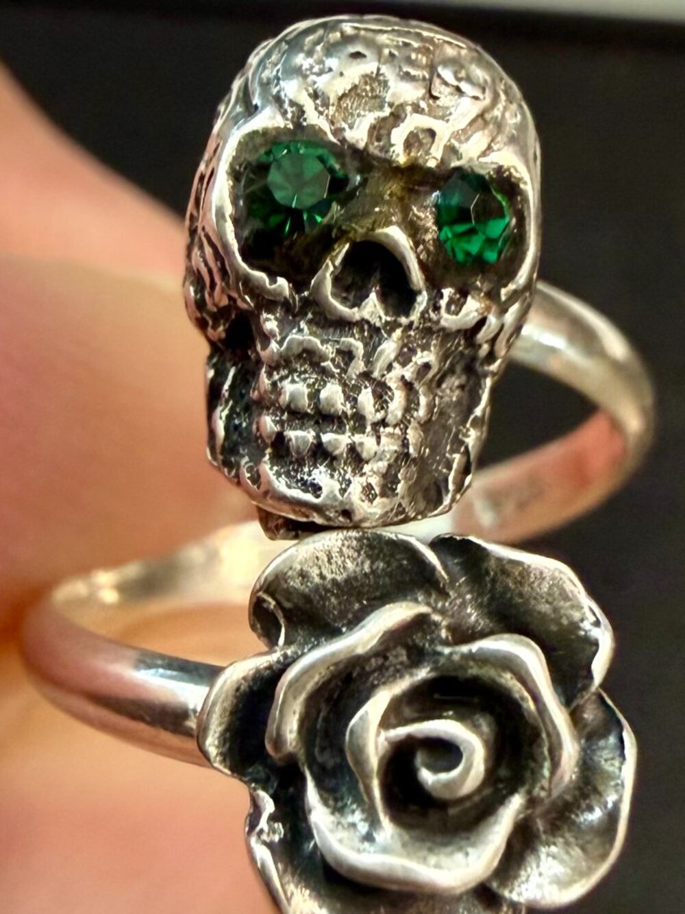 Dainty rose skull ring, sterling silver with green gemstone eyes.